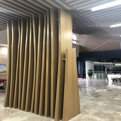 弧形木纹铝方通与弧形波纹铝通 现代装饰材料的创新应用